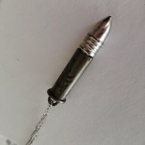 Souvenir bullet pendant unisex